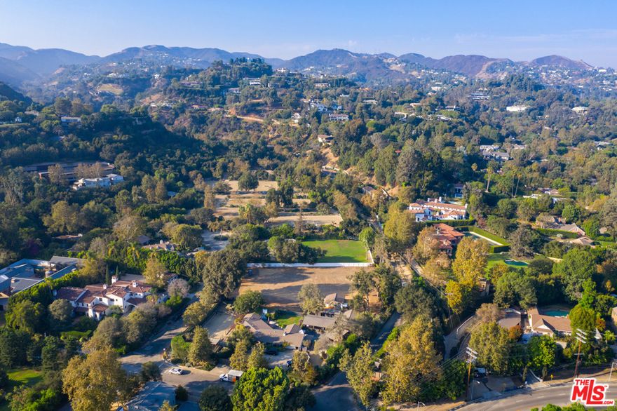 Incredibly rare opportunity to own your own private oasis in storied Sullivan Canyon. Tucked away behind Sunset Boulevard, and just a few miles from the Brentwood Country Mart and shops and restaurants of San Vicente Blvd, this hidden canyon community feels worlds away from the hustle and bustle of the city. A remarkable flat lot that is ideal for building a private estate amongst mature trees and prime California foliage. The property is zoned for equestrian use and is just steps away from the Sullivan Canyon Preservation riding facility. A natural setting that is peaceful and rejuvenating, and with easy access to every convenience. A must see for the most refined buyer looking to build their luxury lifestyle in the heart of Brentwood.