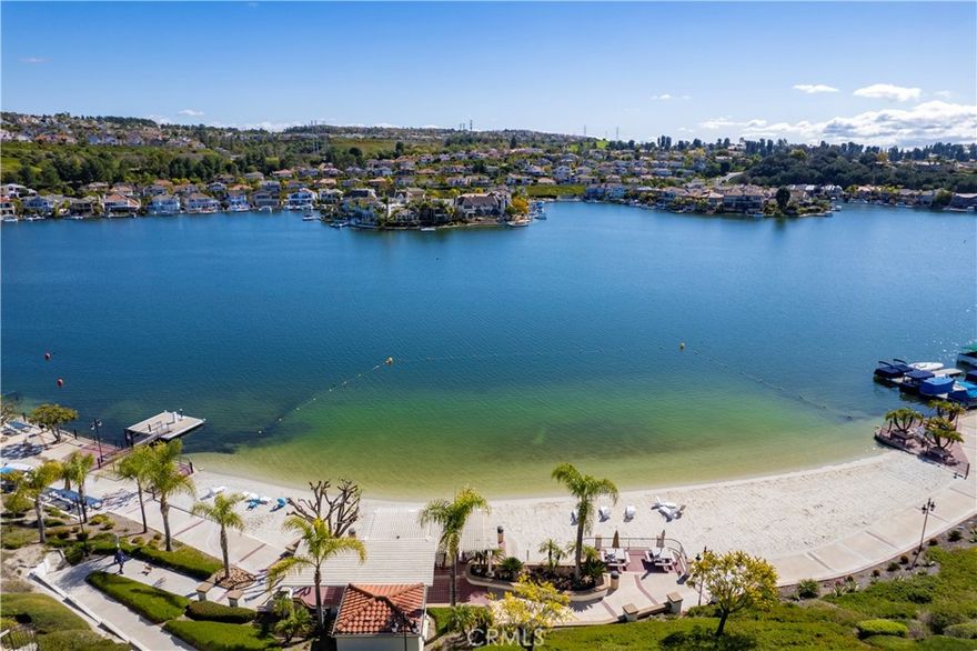 Prime Location! Golf Course-Front Living with Lake Mission Viejo Privileges in a Gated Community of Alta Finisterra! Remodeled 2-bedroom, 2-bathroom condo offers modern luxury, new double pane windows with automatic remote-controlled window treatments, large floor tiles, upgraded recessed and motion sensor lights throughout. Inside, you'll find central heating and cooling, an inside laundry area. The bright living room which offers stunning golf- course views, is anchored with a cozy fireplace. The main bedroom suite is a private retreat with spacious walk-in closet and an update ensuite bathroom.  Enjoy your morning coffee on a secluded balcony which provides direct access to the lush golf course greenbelt. With a detached garage and a dedicated carport parking, this home defines easy upscale  Orange county living. Your HOA includes a year-round heated pool and spa, resort living, security gates, and more importantly, full membership to Lake Mission Viejo.  Spend your weekends sailing, fishing, enjoying lakeside concerts, or just walk to local shops and restaurants, this location is hard to beat!  Offers are being reviewed as they come in. Don't wait---submit your best offer now!