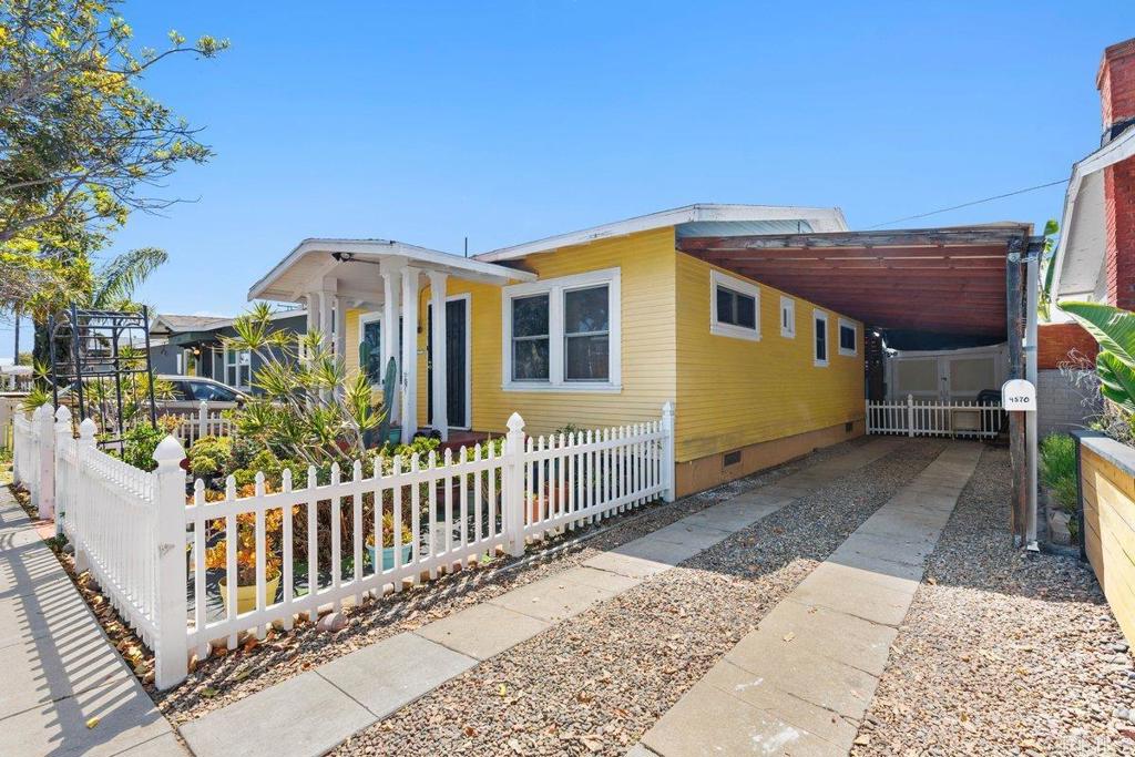 Submit your offer and let's make a deal! University Heights is one San Diego’s most sought-after neighborhoods and this 2 bed 1 bath Craftsman cottage effortlessly blends vintage charm with modern comfort. The 858 sqft offers an efficient layout with proportionate room dimensions for a family room, dining room, kitchen, and 2 bedrooms. Inside, you'll find original hardwood floors, a cozy wood-burning fireplace, arched passageways, and energy-efficient dual-pane windows. The thoughtfully designed layout offers well-proportioned rooms, maximizing both space and functionality. A long covered driveway provides off-street parking for up to 2 cars, complemented by a detached 1-car garage, and a spacious backyard storage shed—perfect for tools, hobbies, or extra storage. The storage shed can stay or be removed at the request of the buyer. Enjoy a prime location just steps from public transportation, minutes to the 8 freeway, 10 minutes from Downtown San Diego, and only 15 minutes from the beach. Whether you're commuting, exploring nearby cafés and restaurants, or relaxing in Balboa Park, this charming home places you in the center of it all. Don't miss your chance to own a piece of classic San Diego in vibrant University Heights!
