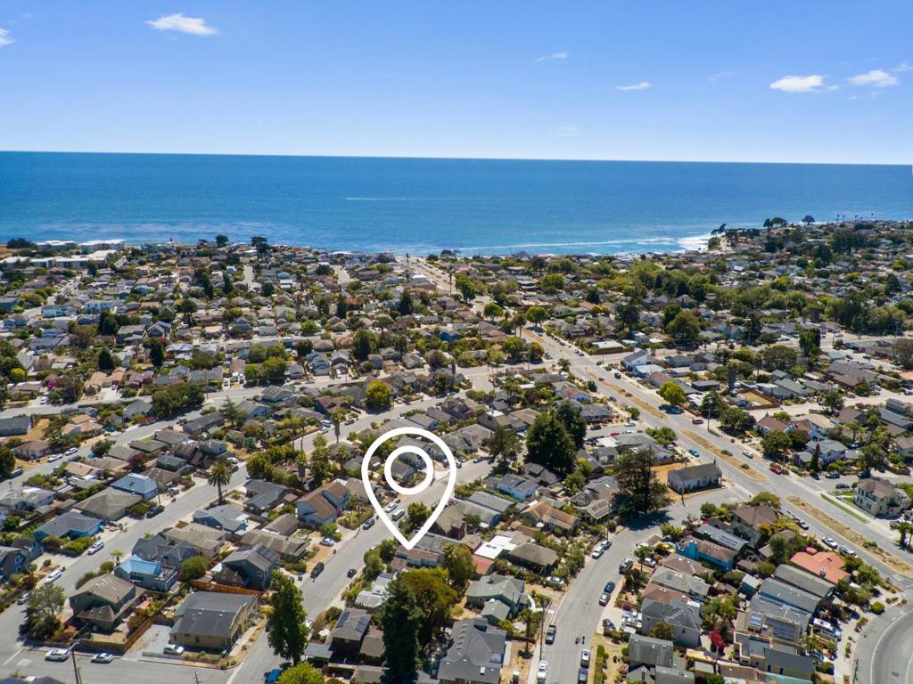 Location, Location, Location! This beautifully maintained 2BR/2BA home with bonus room is located in the highly desirable Circles neighborhood of Santa Cruz. Offering 998 SF of bright, airy living space, this home features tons of natural light with skylights throughout, double pane windows, high ceilings, and fresh interior paint. The kitchen boasts stainless steel appliances, breakfast bar, ample storage, garden window, and generous counter space. Dining area opens to a spacious deck with natural gas fire pit, perfect for entertaining. The bonus room with exterior access is ideal for guests, office, or hobby room. Freshly painted exterior, fenced parcel, and a private feel complete the package. Just 0.5 mi to West Cliff Drive, 1 mi to Swift Street Courtyard, 1.1 mi to Santa Cruz Wharf, 1.3 mi to Beach Boardwalk, and close to UCSC, Natural Bridges, hiking, mountain biking, shops, dining, and world-class surfing. Great opportunity for out door enthusiasts, first-time buyers or investors seeking a prime location with lifestyle and income potential. Schedule a tour today!