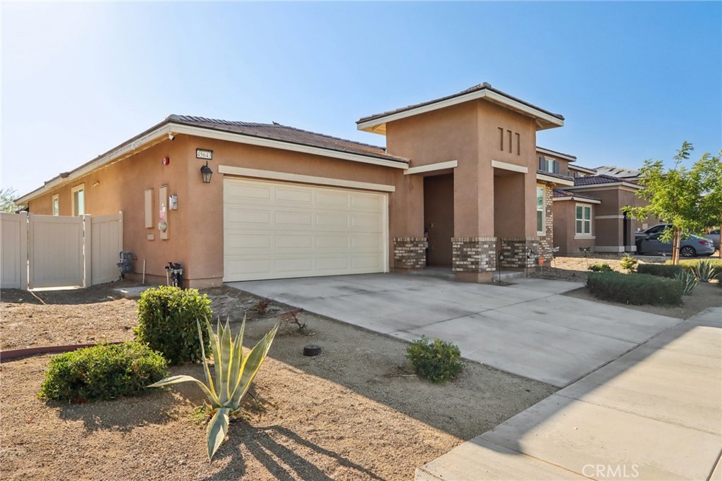 Welcome to this cozy and beautifully maintained newer home, built in 2021 and located on a peaceful cul-de-sac street. Just a short walk from both the middle school and high school, this home offers comfort, convenience, and style.
Step inside to find flooring throughout and a bright, open layout that looks straight out of a model home. The upgraded kitchen is a chef’s dream, featuring granite countertops, a deep basin sink, self closing drawers, recessed lighting, and an abundance of cabinetry and counter space.
The spacious master bedroom includes a walk-in closet, perfect for all your storage needs. Modern features include a tankless water heater and solar for energy efficiency.
Enjoy the outdoors under a covered patio in the large backyard, which has been thoughtfully landscaped with concrete throughout—ideal for entertaining or low-maintenance living.
This is the perfect home for anyone looking for modern comfort, stylish upgrades, and a prime location. Don’t miss out!
