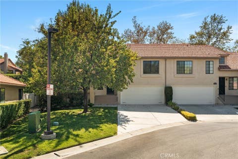 Photo of 20061 Avenue Of The Oaks, Newhall, CA 91321 (MLS # SR26188116)