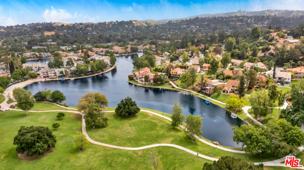 Updated highly desirable ground-floor condo in Calabasas! Luxurious remodeled 2 bedrooms + 2 bathrooms. Fantastic location across the street from the Commons, walk to Calabasas Tennis & Swim Center, and access to the Calabasas Lake! In Unit Washer & Dryer ! The living room has glass sliders to a private patio and opens to the dining room with large windows. All leading into a gorgeous, recently remodeled kitchen. Custom recessed lighting throughout. Newer HVAC, Wall Mounted Large Flat Screened TV's,Master bedroom with private bath and walk-in closet. Tastefully remodeled luxury bathrooms, designer shower and tub, quartz countertops, led lighting, loads of storage, and so much more. Additional bonuses include 2 parking spaces, storage, clubhouse, pool, spa, exercise room, gazebo, guest parking and lush landscaping minutes from Movie Theaters, hiking trails, Premium shopping/dining, and convenient access to Malibu just over the hill. Located in the famed Las Virgenes School District.