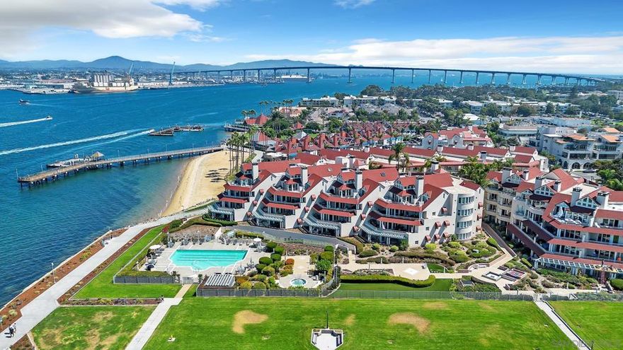 Welcome to Coronado Point - one of the Coronado island’s most coveted bayfront addresses, where sophisticated design meets effortless coastal living. This rarely available first-floor residence captures tranquil San Diego views and offers a seamless blend of comfort and and style across ~1,849 square feet with two bedrooms and 2.5 baths.  The heart of the home is a chef’s kitchen featuring a Sub-Zero refrigerator, Dacor cooktop, granite countertops, and abundant storage—perfect for entertaining. The open-concept living and dining areas flow onto a generous patio with bay and downtown vistas, while a cozy gas fireplace adds warmth and ambiance.  The primary suite is complete with private patio access and a spa-like bathroom. An additional bedroom provides space for guests or a home office.  Residents of Coronado Point enjoy resort-style amenities including a bayside pool and spa with BBQs, well-equipped fitness center, private storage, and two secured parking spaces. Just outside your door, explore Tidelands Park, waterfront walking paths, gourmet dining, and boutique shopping—all within an easy stroll.  Whether you’re seeking a full-time coastal retreat or a luxurious lock-and-leave getaway, this residence offers the ideal luxurious combination of privacy, convenience, and iconic Coronado charm.  Available for lease or lease option. Contact Scott Aurich at 619.987.9797 for more information.