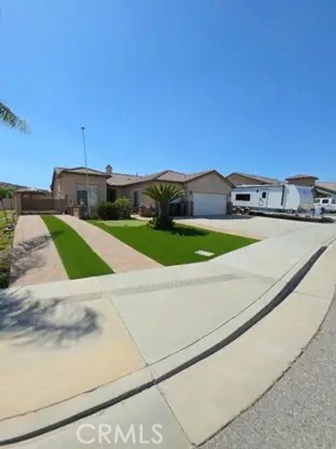 Photo of 27831 Blackhawk Ct, Menifee, CA 92585 (MLS # SW26032754)
