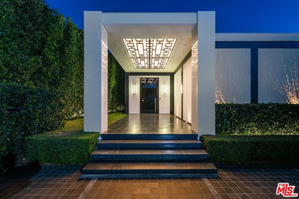 Welcome home to this newly completed Mid-Century modern designed by the master of Mid-Century architecture William Hefner AIA. Very rare opportunity in Trousdale to find 10,000+ SF of new ground up high-end construction. Designed for a family but could be the ultimate couples house. Trousdale is situated at the 50-yard line of Beverly Hills in the most exclusive neighborhood, moments from the best shopping and restaurants. This is why all the titans of the industry flock to this incredible luxurious lifestyle. Gated drive and lush greenery surround the home for ultimate privacy. Oversized rooms with high ceilings and the finest finishes, 6 BD, 8 BA, pool, and all the latest and greatest amenities. Primary suite offers a spa-like bathroom clad in gorgeous polished Pentelikon, designer walk-in closet, and sweeping views. Fully automated Crestron estate is complete with executive office, media room, theater, fitness center, temperature-controlled wine cellar, and two-car garage with lift for 2 additional cars. All the rooms, in all the right places with sunlight and views everywhere and the best finishes throughout. This home is perfection and the pinnacle of Trousdale living.