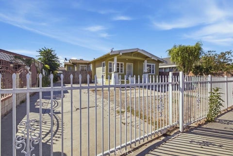 Photo of 1836 E 71st ST, Los Angeles, CA 90001 (MLS # SB26218805)