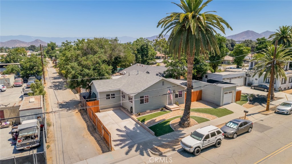 Welcome to this Charming 1911 Vintage Home Just Steps from Downtown Riverside! THis delightful three-bedroom, two-bathroom home is nestled in the heart of Riverside, California. Built in 1911, this property has been lovingly maintained while retaining its classic charm. Spanning approximately 1,330 square feet, the spacious interior boasts a welcoming floor plan that is perfect for both entertaining and everyday living. Each bedroom is filled with natural light, the primary suite includes a spaciou closet and en suite with tons of privacy.
The open-concept living room features a large window framing scenic views and flows seamlessly. The kitchen boasts upgraded cabinets and countertops with custom tile backsplash, tile flooring run through most of the living areas and bedrooms, adding warmth and character throughout.Outside, enjoy low-maintenance, drought-tolerant landscaping in both the front and back yards. Relax in the peaceful backyard oasis. The detached garage offers ample room for storage, a home office, gym, or creative space. RV PARKING !!! Do you Love the outdoors? Walk or bike to Mt. Rubidoux and Fairmount Park and minutes 60 fwy!Don’t miss the opportunity to own a piece of Riverside history with modern-day comforts!