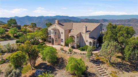 Photo of 10827 Pacific View DR, Malibu, CA 90265 (MLS # OC26221048)