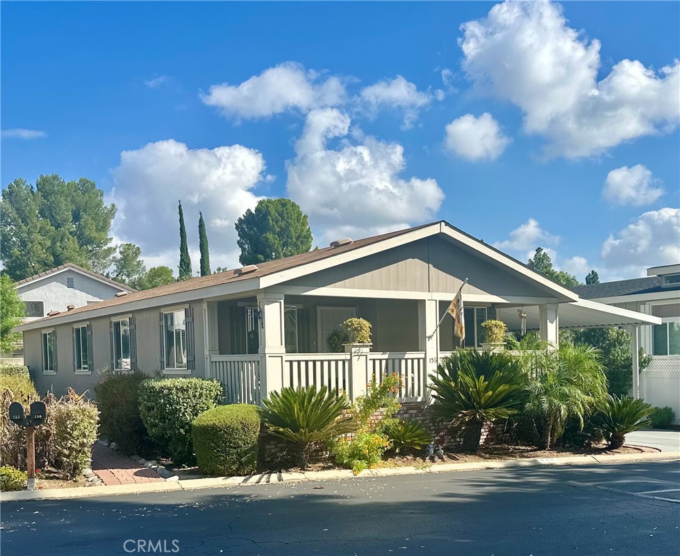 Welcome to the 55 years old plus Community. Lake Los Serranos Club. This Home features 2 Bedrooms with a Den or Office and 2 full baths. Enjoy an Open floor plan for entertaining guest. Kitchen equipped with Appliances and Island. Front Covered porch is designed for sitting to enjoy the outdoors. If you have a few extra item to store, no problem! Shed is close by under the carport. Yard is fully landscaped and ready for your added touches. This home was built in 2013 and has modern standard features, insulation, drywall, high ceilings and vinyl windows. This park is a must see experience. Trees, greenbelts, lake and plenty of walking areas. There is 2 clubhouses for your enjoyment and plenty of community events. Come and take a look!!