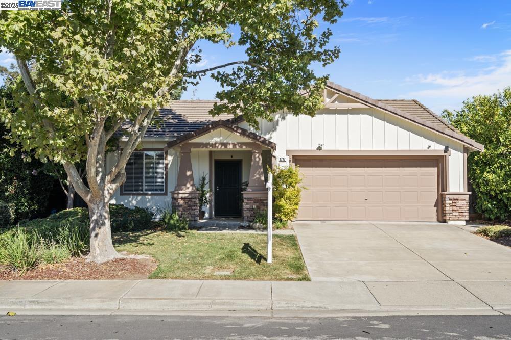 Experience comfort and convenience in this inviting 3-bed, 2-bath ranch-style home in Livermore’s coveted Summerset community. Built in 1998, the single-level floor plan spans 1,348 sq ft and sits on a generous 5,415 sq ft lot. Designed for both style and function, the home features an open eat-in kitchen with granite countertops, high ceilings, dual-pane windows, and hardwood floors throughout. The living space is enhanced by a cozy fireplace in the family room, and climate control is made easy with central heating and air conditioning. Practical touches like an attached two-car garage with in-garage laundry and a modern sprinkler system in the landscaped yard add everyday convenience. The exterior's wood-and-stone finish, tiled roof, Solar Panels and slab foundation contribute to its enduring curb appeal and low-maintenance elegance. Situated in a well-regarded school district and backed by a modest HOA that supports community upkeep, this home merges peace of mind with pleasant surroundings.