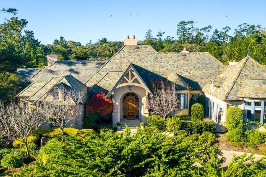 This classic 4 bedroom home sits on a level 1.5 acre site within walking distance to the Lodge and Equestrian Center. Offering exquisite craftsmanship, this home presents a timeless feel, both gracious and comfortable. Phenomenal chefs kitchen open to an expansive family room, elegant library, formal dining room and enormous home office are just a few of the amenities offered in this grand home. Exceptionally private, the property is surrounded by beautiful gardens and stone patios. A true Pebble Beach classic.