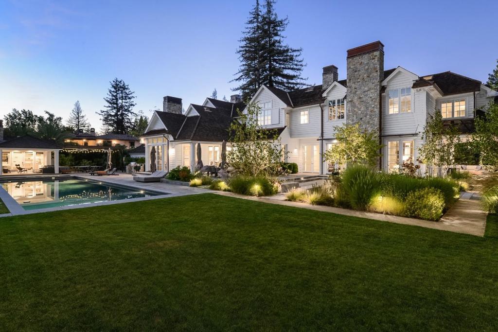 Privately positioned on approximately one acre, this tour-de-force is a residence of chic modern elegance with every amenity needed for a life of wellness. Built by Pacific Peninsula Group in 2013, & renovated with designer touches throughout where every inch is fabulously rendered with uncompromising quality & detail. The color palette & high-end designer lighting are serene and calm and every space flows easily to the next. Health & wellness take center stage with amenities like varying levels of light and air control in the primary suite, ice bath, spa, sauna, & cold plunge for rejuvenation, plus numerous options for today's needs. The 3-level home comprises 5 bedroom suites plus a 1-bedroom guest house. The property also includes a movie theater, fitness center, plenty of room, and a huge storage room. Cutting-edge technology behind the scenes provides for the ultimate comfort & convenience. The grounds are remarkable with new landscaping & new pool w/ built-in spa and cold plunge.