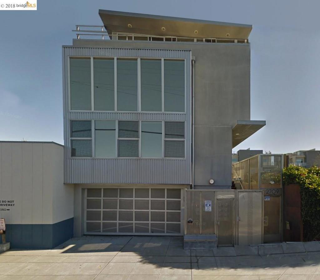 Sleek architecturally designed West Berkeley 3 story 2BD/2BA live/work loft. First floor is level into a bedroom/ office/workspace, a living room with high a high ceiling that get flooded with light from the skylight and glass blocks plus a full bathroom. On the second level there is a spacious eat in kitchen with sleek stainless-steel appliances, granite counters and views of the city with sliding doors to a large private deck. The third floor is the master suite with lots of windows, a seating area and views of SF and bathroom with a shower over the tub and a beautiful glass bowl sink. There is an in unit stack washer/dryer.The location is ideal for those that like living close to BART, the Berkeley Bowl, cafes, top restaurants and less than 3 miles to UC Berkeley.