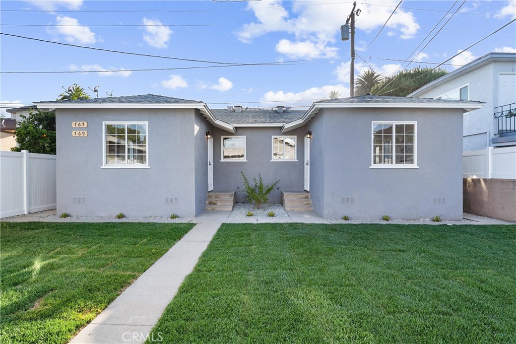 Live in style in this beautifully remodeled 1-bedroom, 1-bath unit tucked away in the back of a fully upgraded triplex in a prime Long Beach location. The unit features a modern kitchen with shaker cabinetry, quartz countertops, stainless steel appliances, and a designer-tiled bathroom with an updated vanity and contemporary fixtures. Inside, you’ll find luxury vinyl plank flooring, fresh paint, updated lighting, high squared-off baseboards, and convenient in-unit laundry. The property has undergone significant system upgrades, including updated electrical panels to support modern appliances and refreshed plumbing. A newly poured concrete driveway, fresh sod with irrigation, and modern fencing add privacy and curb appeal. Enjoy quiet, comfortable living with off-street parking included and easy access to local shops, restaurants, and freeways. Available for immediate move-in.