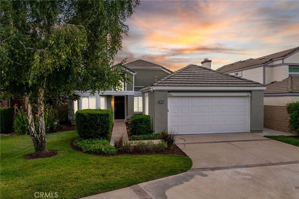 Sold before MLS, data entry only. Fully Remodeled Single-Story View Home in the Exclusive Live Oak Gated Community. This completely remodeled single-story home offers sweeping panoramic views of the reservoir—an amenity enjoyed by only a select few properties in the community. With a long private driveway, manicured landscaping, and a covered entry, the curb appeal is both elegant and welcoming. Step inside to soaring vaulted ceilings, brand new luxury vinyl plank flooring throughout, and sun-drenched interiors that immediately evoke a sense of openness and calm. The formal living room features a large picture window framing the front yard, while the adjacent dining room is perfectly positioned near the kitchen for easy entertaining. The brand-new kitchen is a standout, showcasing shaker cabinetry, quartz countertops and backsplash, stainless steel appliances, and a cozy breakfast nook that overlooks tranquil water views, an ideal backdrop for morning coffee or evening gatherings. The adjoining family room continues the open flow, offering vaulted ceilings, a white-painted brick fireplace, and large windows that capture backyard and water vistas. The primary suite is a true retreat, featuring vaulted ceilings, direct access to the backyard through sliding glass doors, and unobstructed views of the reservoir. The fully renovated primary bathroom offers matching cabinetry and quartz counters, a walk-in shower with frameless glass, a separate soaking tub, and a generous walk-in closet. Two additional bedrooms provide flexibility for guests, family, or a home office, one of which features double doors that open to the entry way and a front-facing window. A remodeled hall bathroom and an indoor laundry room with direct access to the two-car garage complete the interior layout. The backyard offers a peaceful, low-maintenance setting with a concrete patio, planter beds, and breathtaking water views that are perfect for relaxing, entertaining, or simply enjoying the serenity of the setting. Live Oak residents enjoy access to a gated pool and spa just across the street, along with the safety and peace of mind of a private community. This rare view property combines luxury updates, single-story convenience, and a truly special location.