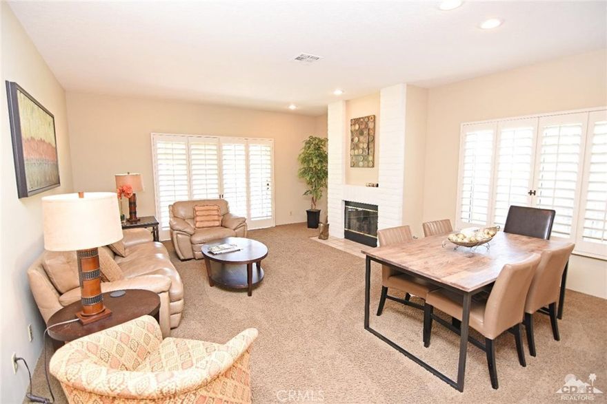 Resort living at it's finest. Beautiful 3 bedroom (2 plus den) with 2 1/2 baths downstairs condo is located in Desert Falls CC. The kitchen has been remodeled with granite counters, new cabinets and stainless steel appliances. Quiet interior prime location and conveniently close to a pool. Nicely furnished, gas fireplace and shutter window coverings throughout. If you are looking to be a full or part time resident or buy for an investment this is the perfect property and the perfect location. Included in your HOA dues are 4 pickle ball courts and lighted tennis courts as well as a state of the art fitness center and more. The golf course at Desert Falls is a semi private club so you can pay as you play. There is also a clubhouse for dining. Desert Falls CC is centrally located to shopping, dining and the JW Marriott hotel. As a resident of Palm Desert you are eligible to play Desert Willow golf courses at a great discounted rate. They are located across from DF. Must See!