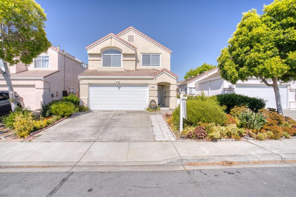 This beautifully maintained 2-story home offers 4 bedrooms, 2.5 baths, and 1,867 sq ft of comfortable living space in a peaceful, highly sought-after neighborhood. Enjoy soaring vaulted ceilings, abundant natural light, brand new floors, fresh interior paint, and an upgraded kitchen that opens to a spacious family room. Perfect for entertaining or everyday living. The formal dining area and bright living room enhance the home's open layout. Upstairs, all four bedrooms are generously sized with vaulted ceilings and plenty of natural light. The large primary suite includes a cozy sitting area, walk-in closet, and extra storage. Additional highlights include a two-car garage with a Tesla charger and easy walkability to Dixon Landing Park. Conveniently located near major tech companies, Great Mall, Levis Stadium, and with quick access to Hwy 237 & 880. Zoned for top-rated Milpitas schools. Don't miss this fantastic opportunity schedule your tour today! No HOA dues, no restrictions just great space, schools, and location. Dont miss this one!