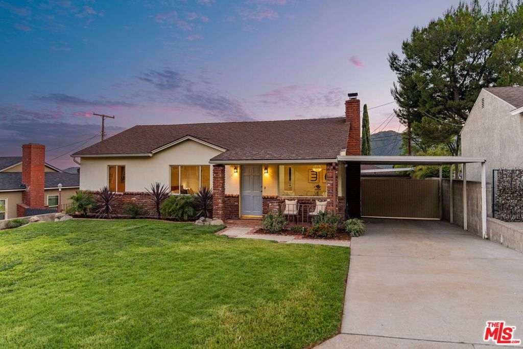 Just steps from Valley View Elementary, this La Crescenta home combines classic character with smart updates. The main house offers three bedrooms and two bathrooms across 1,262 square feet, along with a detached 658 square foot bonus room that adds extra flexibility. Inside, the layout blends open flow with well-defined spaces. A brick fireplace anchors the living room, which connects to the dining area and kitchen through a passthrough counter that's great for casual meals or homework time. The kitchen is fresh and efficient, with new quartz countertops, clean cabinetry, updated appliances, and plenty of space to cook and gather. All three bedrooms get great natural light and offer generous closets, with enough separation to create privacy. Out back, the detached bonus room gives you room to spread out. It could be a home office, gym, studio, media room, or even a potential ADU if desired (buyer to verify). Fresh paint, new flooring, and ample storage spaces throughout make this home feel current and move-in ready. Set on a quiet street near parks, hiking trails, and local shops, this is a solid opportunity in one of La Crescenta's most desirable neighborhoods.