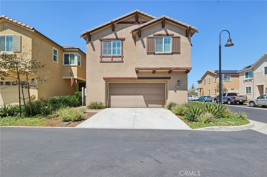 Welcome to this stunning 4-bedroom, 3-bath smart home located in the highly desirable Fairway Community of Bonsall which was built in 2022. Designed with modern living in mind, this residence is filled with an abundance of natural light and features plantation shutters in every room for timeless style and privacy. The versatile first-floor bedroom and full bath are perfect for guests or extended family, while the open floor plan is enhanced by infrastructure heating and air conditioning powered by 19 owned solar panels, ensuring year-round comfort and energy efficiency. Upstairs, a spacious loft offers the ideal setting for a game room, home office, or additional lounge space. The primary suite boasts a generous walk-in closet and spa-inspired bath, and a separate laundry room on the second floor adds convenience. Outdoors, the upgraded backyard showcases stylish tile pavers and low-maintenance artificial grass—perfect for entertaining or relaxing. With thoughtful upgrades throughout, this home combines contemporary style with everyday convenience in a premier Bonsall location with close proximity to the 76 & 15 freeway. This is a great location for those looking for North San Diego County living at it’s best.