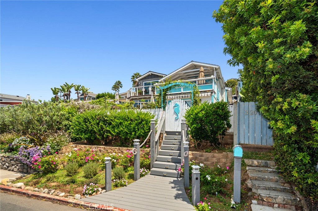 This beautifully upgraded cottage spans approximately 1,000 square feet of living space, including one bedroom, an office and one bathroom, encompassing stunning views of the Ocean and Catalina Island from the living room and kitchen. Offering great features, including an open floor plan, back patio and yard, porcelain floors and an upgraded kitchen that is sure to impress. This property embodies coastal living at its finest, this home is just a stone's throw away from Thousand Steps Beach. Easy access to Trolley with service to downtown Laguna Beach, shopping, and restaurants. While also being minutes away from South Laguna, Dana Point Harbor, and world-renowned hotels and resorts.