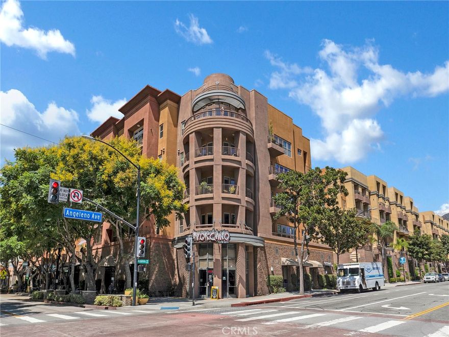 FOR SALE OR FOR LEASE!Welcome to 201 E Angeleno Avenue, a stylish single-level condo at Burbank Village Walk perfectly situated in the heart of trendy Burbank. This prime location puts you just steps away from theaters, eateries, coffee shops, fitness studios, and everything downtown Burbank has to offer.

The open-concept floor plan features a kitchen with a center island that seamlessly flows into the spacious great room—ideal for both everyday living and entertaining. A private balcony helps blend the interior and exterior space, offering the perfect spot to relax with your morning coffee or unwind in the evening.

Upscale wood flooring and modern finishes add a touch of sophistication throughout, creating a turnkey home in one of the most sought-after locations in Burbank Village Walk. Spacious primary suite with enormous walk in closet and ensuite bathroom.  Secondary bedroom is good sized with an adjoining bathroom.  The tall ceilings and abundant light make this space really happy space. The townhouse is equipped with central heat and air for year-round comfort.  Located in the highly sought-after Burbank Village Walk complex, residents can enjoy a range of on-site amenities including a refreshing heated  pool, BBQ grills, an outdoor patio fireplace with seating, a fitness center, and 24/7 security. Just steps away from some of the best restaurants, entertainment, and the Metro Link, you’ll have everything you need at your doorstep. Don’t miss the opportunity to rent this rare end unit townhouse in Downtown Burbank.