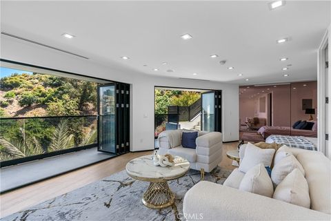 Photo of 8144 1/2 Gould AVE, Los Angeles, CA 90046 (MLS # AR26162061)