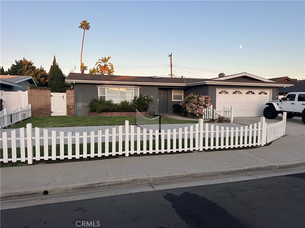 One of the nicest and most neighborly streets in Mesa Verde and a cul-de-sac. With an east/west exposure for maximum lighting this loved home offers a true LIFE experience. There is a front yard patio for any kind of entertainment that extends to the back where there is a pool with a slide and sports court. This is a fun place for you and your family to entertain. Kitchen opens into the dining area with a large room to entertain.... and it is beautifully redone. One of the bedrooms is being used as an office with a window onto the street...again the natural light is wonderful. Wood floors for easy maintenance and design. Garage has extra storage... all closets have built-ins and are good sized, Remodeled bathrooms and fine details make this an easy to live in and enjoy experience. Perfect for your pet too. The location is just a few minute bike ride to some of the best walks and rides along the Santa Ana trail system. And quite simply Mesa Verde just rocks when you are looking for quiet and a location that is a short drive to the beach or freeway system. The best restaurants and shopping are right here too.