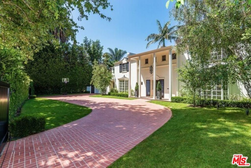 This magnificent property on S Beverly Glen Blvd is on the majestic stretch between Sunset and Wyton, across the street from $60M+ homes and Holmby Park, and convenient to any Westside location. With 4 bedrooms plus 2 additional rooms/offices, and 6 bathrooms, this grand Traditional Estate is the perfect family home. The first floor features a grand formal living room with a fireplace, a formal dining room, and a family room with vaulted ceilings, a fireplace, and a wet bar with a temperature controlled wine closet for 200+ bottles. The stunning gourmet kitchen with custom cabinetry offers a multitude of built-ins framed by unique Wenge wood countertops, separate Sub-Zero refrigerator and freezer units, a Dynasty range with double ovens, a Viking warming unit, and a breakfast area. Almost all first-floor rooms open to the spacious backyard, which features an open patio, swimming pool, and lawn. The double-gated circular driveway and 2-car garage offers more than enough parking for 8+ cars and provides easy entry and departure. Don't miss this opportunity to live in the highly coveted neighborhood of Little Holmby! THERE IS NO SIGN ON PROPERTY.