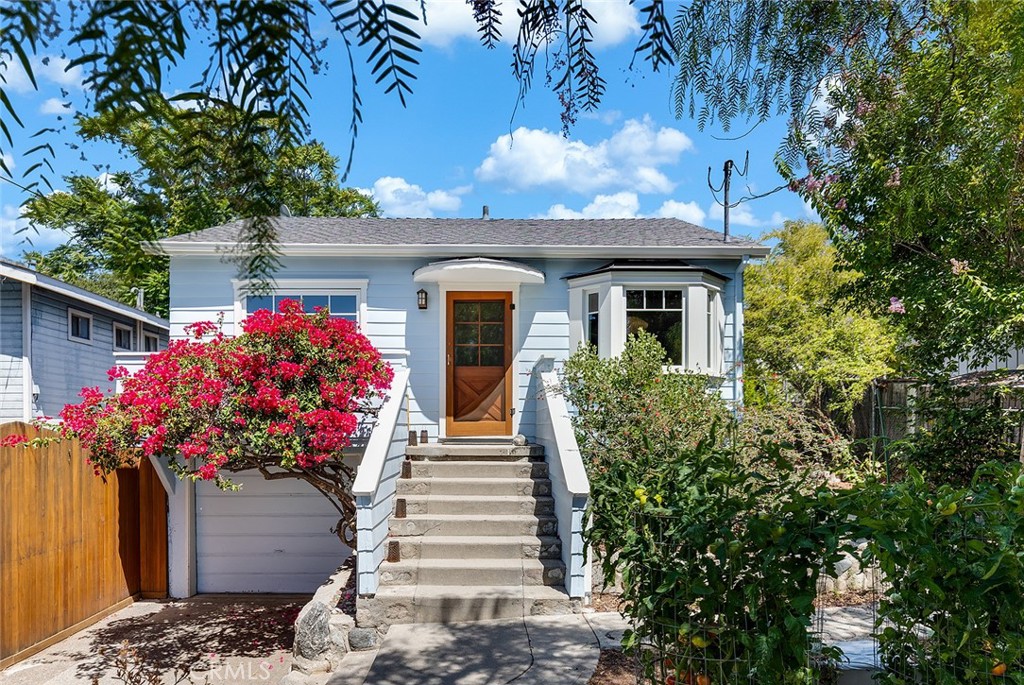Charming 3-Bedroom Hillside Retreat with Curated Garden / Welcome to 10522 Fernglen Ave – a beautifully maintained 3-bedroom, 2-bathroom home nestled in the tranquil foothills of Tujunga. This character-filled property combines vintage charm with thoughtful updates, offering serene living in a meticulously curated garden setting. Step inside to find a bright and airy layout with original hardwood floors, abundant natural light, and tasteful finishes throughout. The spacious living areas are complemented by a fully equipped kitchen and two bathrooms. The third bedroom makes an ideal office, guest room, or creative space. The outdoor space is a true retreat – a private, fenced-in yard with shaded sitting areas and established trees, perfect for quiet mornings or evening entertaining. As a unique bonus, the owner is offering the option to include select gallery-quality photographs to elevate the interior aesthetic. This home is ideal for someone who appreciates peaceful surroundings, refined details, and living with art. Showings by appointment only.
Features:
* 3 bedrooms / 2 bathrooms
* 1,375 sq ft (Public Record)
* Central A/C and heat
* Washing machine (No Dryer)
* Professionally landscaped garden
* Optional gallery art on walls
* No pets
* $4,300/month
* $6400 deposit
* Renters pay all Utilities except Water
* 1-year lease