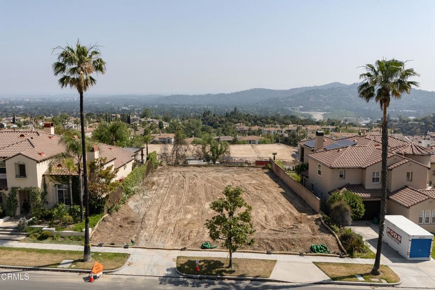 Here's your opportunity to build your dream home with incredible views in the gated community of La Vina! Situated against the backdrop of the foothills, this approximately 8,104 sqft lot was razed by the Eaton Fire. Prior to the fire, there was a 5 bedroom, 5 bathroom, 5,128 sqft single family home on the property. The community of La Vina has a park and pool. Views to the mountains and city, proximity to hiking trails, and Loma Alta Park with its children's park, tennis courts and picnic areas were some of the many things the owner loved about living here. Prior home had gas, water, electric and sewer connection, but the current condition of those utilities is unknown. Buyers are advised to independently verify all aspects of the property with the County of Los Angeles and appropriate government agencies, including, but not limited to, lot remediation, future use of the property, rebuilding and permitting requirements, zoning and lot size. Buyers are advised to consult with the La Vina Homeowners Association about community rebuilding guidelines. Property is being sold in as-is condition without warranties or guarantees of future use. Drive-by only, do not walk on the property.
