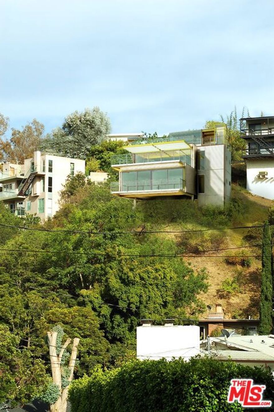 Amazing development opportunity. Located in one of the most desirable streets in the Hollywood Hills. Presenting the opportunity to create The Fratzi House, designed by PAT Architects from Italy a Globally Recognized and Published Architectural firm. This lot offers the opportunity for a sleek contemporary 3 bedroom multilevel home, with elevator. The seller has spent tremendous capital (over $100k!) investigating and designing this lot and proposal, including, but not limited to, architectural and structural plans, geo & soils report, topography, slope analysis, road enlargement, grading, drainage, inspection report and HVAC-- some of these PDFs are included in the documents section of the MLS, all others can be provided upon request. Note that the Broker and Broker`s agent do not guarantee lot size or lot lines/dimensions. Buyer to rely on their own investigations to complete plans approvals and permits through personal inspection and/or with appropriate professionals. Lot being sold as-is/where-is. Drive by only. Contact listing agent with questions or for additional details.