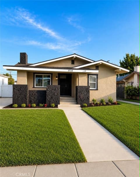 Photo of 1724 W 43rd Street, Los Angeles, CA 90062 (MLS # DW26168676)