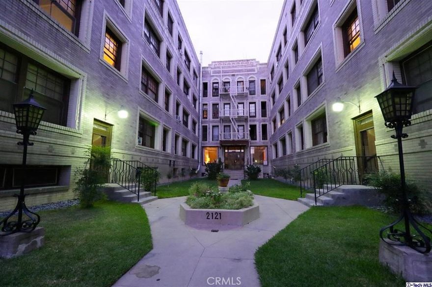 Charming converted studio located in a historic, well-maintained building situated between Downtown Los Angeles and the Mid-Wilshire neighborhoods. This bright and inviting unit features 9-foot ceilings, original hardwood floors, an updated kitchen with newer appliances, and a full bathroom with a tub. The space includes a converted bedroom area, ample closet and storage space, and enjoys abundant natural light throughout. Residents enter through a secured, earthquake-retrofitted courtyard and have access to a wide range of amenities including free Wi-Fi in common areas, on-site community laundry, a library, piano, recreation room, billiard and ping-pong tables, bike racks, and an exercise room. All utilities are included in the monthly rent, excluding cable. Ideally located just three blocks from the Westlake/MacArthur Park Metro Red Line station, this unit offers easy access to LA Live, Downtown, Staples Center, FIDM, USC (1.5 miles), and Loyola Law School. While there is no parking structure on-site, street parking is available, and a private parking facility is located just 900 feet away at 942 S. Alvarado St. A perfect opportunity for professionals or students seeking comfort, convenience, and character in the heart of the city.