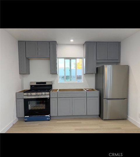 Photo of 240 E 84 TH, Los Angeles, CA 90003 (MLS # DW26044707)