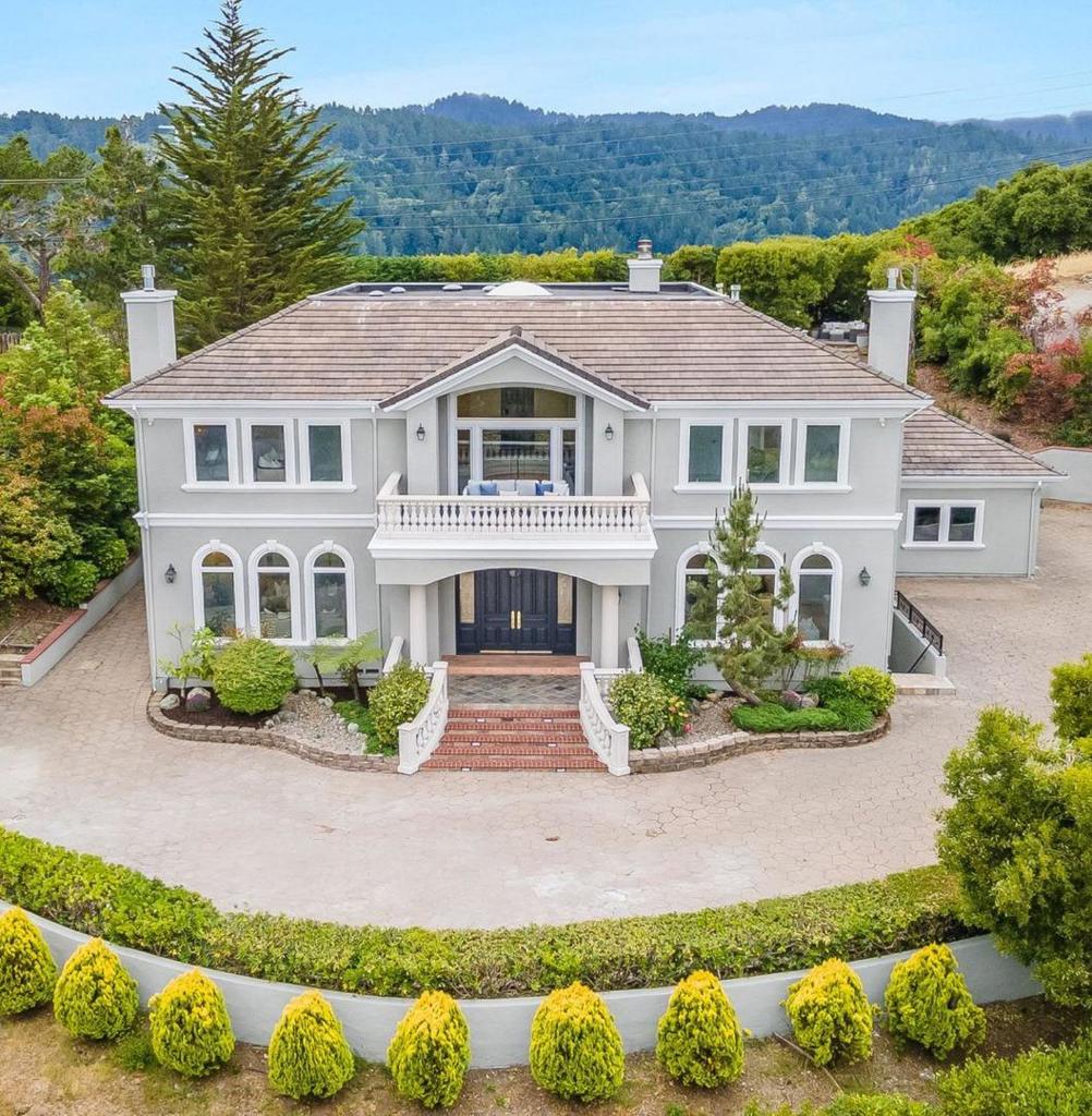 Welcome to this stunning, newly remodeled 6-bedroom, 6.5-bathroom home located in the desirable city of Hillsborough. This expansive residence boasts 6,690 sq. ft. of luxurious living space on a generous 36,920 sq. ft. lot. The gourmet kitchen is a chef's dream, featuring a gas cooktop, island with sink, quartz countertops, multiple wine refrigerators, freezer, and additional high-end appliances, including multiple dishwashers and oven range. Entertain guests in the formal dining room or the cozy breakfast nook with family room combo. The home features elegant brand new wood flooring throughout and includes amenities such as walk-in closets, vaulted entry, bay windows, built-in vacuum, high ceiling, security gate, and skylight. Enjoy the warmth of the fireplace on cooler evenings. The primary bedrooms offer a retreat with walk-in closets, oversized tubs, and steam shower. Convenience is enhanced with a ground floor bedroom and full bath, plus laundry facilities located on the upper floor. The home is equipped with central AC and heating for year-round comfort. Located within the Hillsborough City Elementary School District, this exceptional property offers the perfect blend of luxury and functionality.
