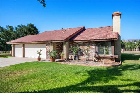Photo of 6304 Glen Aire Avenue, Riverside, CA 92506 (MLS # CV26171108)