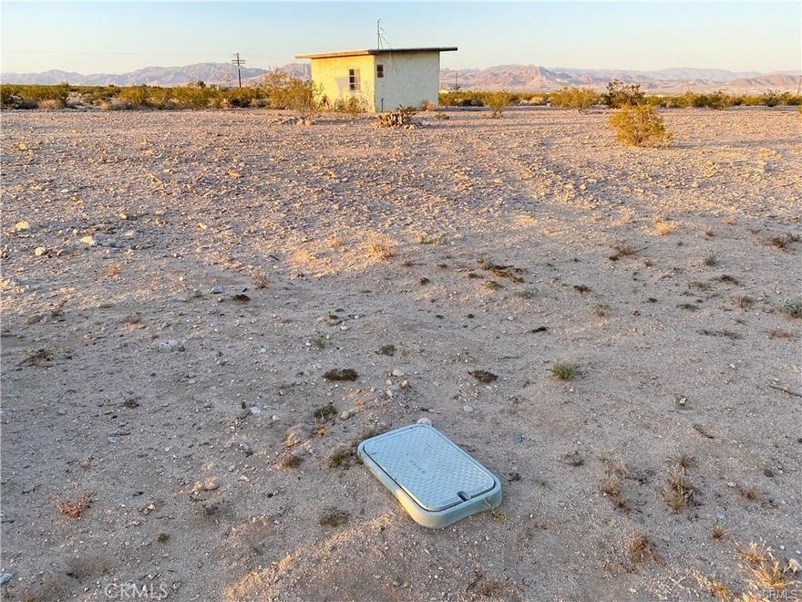A great opportunity presents itself here with this property! This property has all you need to get started on creating your own slice of heaven! This area sits on a generous 5 acres of land! The connecting properties to the southeast include 60 acres of government-owned land, so that land will never be built on or developed! The surrounding land makes for great open views and perfect opportunities for endless outdoor activities and adventures. This property has water on-site and has had electrical power to the building with evidence of a previously installed electrical meter (see pictures). The power pole is just south of the property line by approximately 50 feet. This property is also off two main paved roads, which means easy access! With five acres of land, the possibilities are endless! Whether you want to build your dream outdoor getaway paradise, create a tranquil gardening space, or ride your quads on an adventure into the great outdoors, whatever dreams and desires you may have, this property can help make all your dreams a reality! Don’t miss out on this wonderful opportunity!