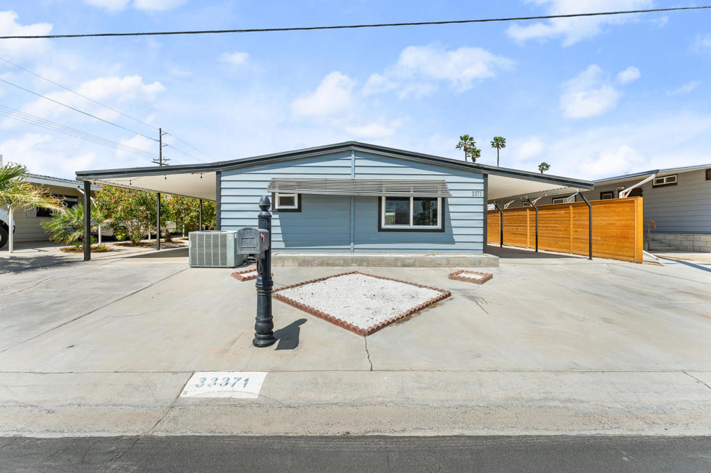 SELLER IS WILLING TO FINANCE WITH 20% DOWN OR SELLER IS OPEN TO COMPLETING A 433A PERMANENT FOUNDATION. YOU OWN THE LAND, LOW MONTHLY HOA, 55+ COMMUNITY! Don't miss your chance to own this beautifully updated 2 bed, 2 bath home featuring a bright open-concept layout and breathtaking panoramic views of the mountains and golf course. Recently renovated, this home blends modern design with exceptional comfort, it features a brand-new kitchen with elegant quartzite countertops, recessed lighting, an extra-large living room enhanced by picture windows, new flooring, smooth ceilings, and stylishly updated plumbing and lighting fixtures throughout. Seller is willing to finance with 20% down, or Seller is open to completing a 433A foundation to allow financing options such as FHA, Conventional, and VA loans, contact me for more info. As a resident of Tri-Palms Estates, enjoy FREE GOLFING and fantastic community amenities including two outdoor pools and spas, well-maintained shuffleboard courts, illuminated tennis courts, and a clubhouse with dining, banquet facilities, and a recreation lounge. Conveniently positioned near the I-10 freeway with quick access to Walmart, Home Depot, Costco, and Sam's Club, you're within 20 minutes of everything the Coachella Valley offers. Plus, being within IID territory means lower electric bills. Don't miss this incredible opportunity--act quickly and make your offer today!