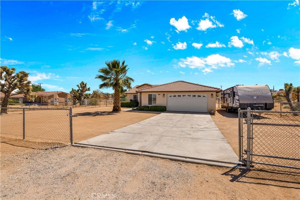 Photo of 58085 Belmont Street, Yucca Valley, CA 92284 (MLS # JT26082320)