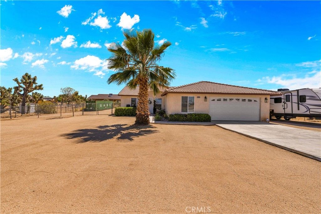 Photo of 58085 Belmont Street, Yucca Valley, CA 92284 (MLS # JT26082320)