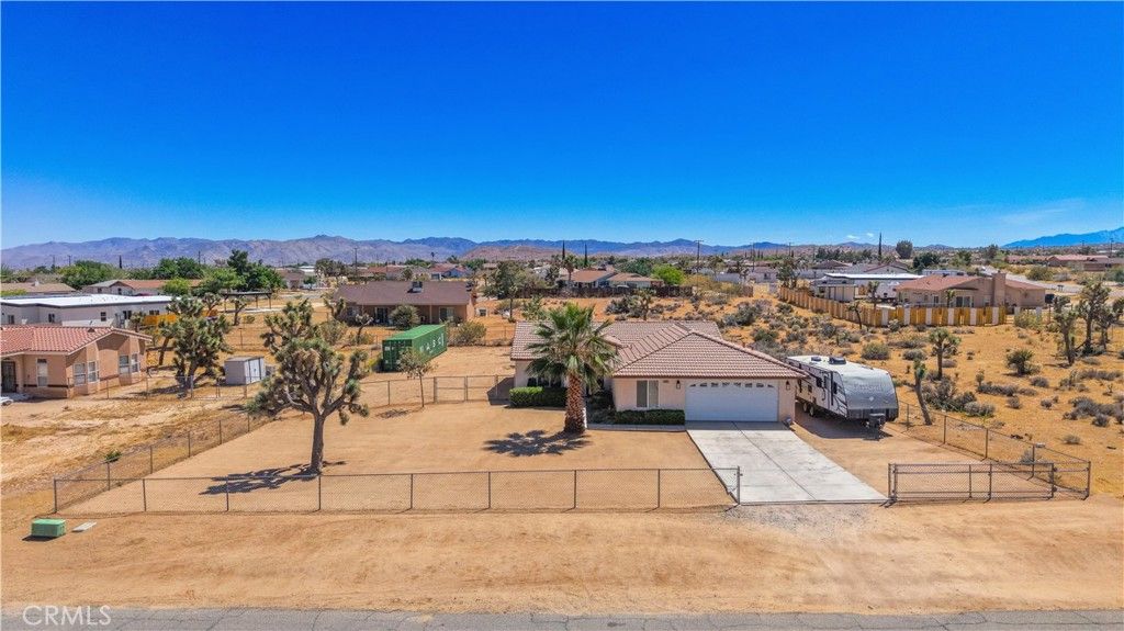 Photo of 58085 Belmont Street, Yucca Valley, CA 92284 (MLS # JT26082320)