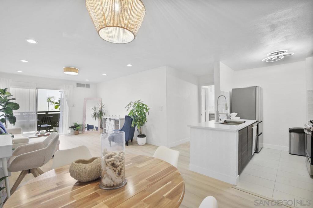 Beautiful condo in the heart of Mission Valley, showcasing exceptional pride of ownership. Optional: Can be sold with all the furniture! This updated home features a modern kitchen with sleek cabinetry, glass backsplash and stainless-steel appliances. The elegant bathroom includes a tiled shower with a glass door and updated lighting fixtures. Enjoy a private balcony perfect for unwinding in the evening. Located in a well-maintained community offering fantastic amenities such as tennis courts, a pickleball Ct, a gym, sauna, pool and spa, BBQ area, billiards room, walking paths, and a dog run. Conveniently close to shopping, major freeways, the beach, Presidio Park, Old Town, and Downtown. Home can be sold with or without furniture.