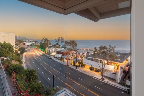 Photo of 730 N Coast Highway Hwy, Laguna Beach, CA 92651 (MLS # OC26058356)