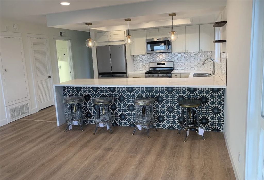 Photo of 730 N Coast Highway Hwy, Laguna Beach, CA 92651 (MLS # OC26058356)