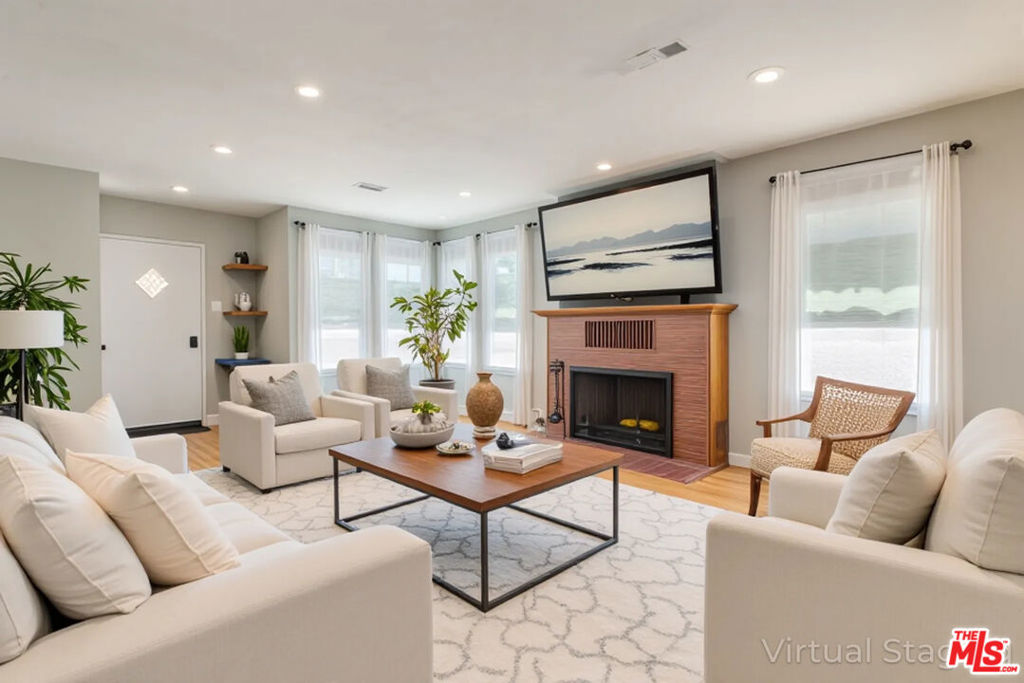 Welcome to this updated 4-bedroom, 2-bathroom home located in the heart of Central Torrance. Offering 1,719 square feet of comfortable living space on an oversized lot, this property combines modern upgrades, outdoor luxury, and rare development potential. Step inside to discover hardwood floors throughout, remodeled bathrooms, and central air conditioning for year-round comfort. The home also features a paid-off solar system and a new roof, ensuring energy efficiency and long-term savings. Designed with sustainability in mind, the home includes an EV charging station, perfect for eco-conscious living. The highlight of the residence is its luxurious spa bathroom, complete with a deep soaking tub, a walk-in rainfall shower, and high-end finishes that evoke a serene, resort-like atmosphere offering the perfect retreat at the end of the day. The real showstopper is the extra-large west-facing backyard, perfect for entertaining, relaxing, or expanding. Enjoy stunning sunset views from your private oasis, complete with a new pool, low-maintenance turf, decomposed granite walkways, pavers, two inviting patio areas, and a mature citrus tree. This property is zoned for two units, and approved ADU plans are included in the sale, which is an incredible opportunity for rental income, multigenerational living, or added value. Don't miss your chance to own this rare gem in one of Torrance's most desirable neighborhoods!