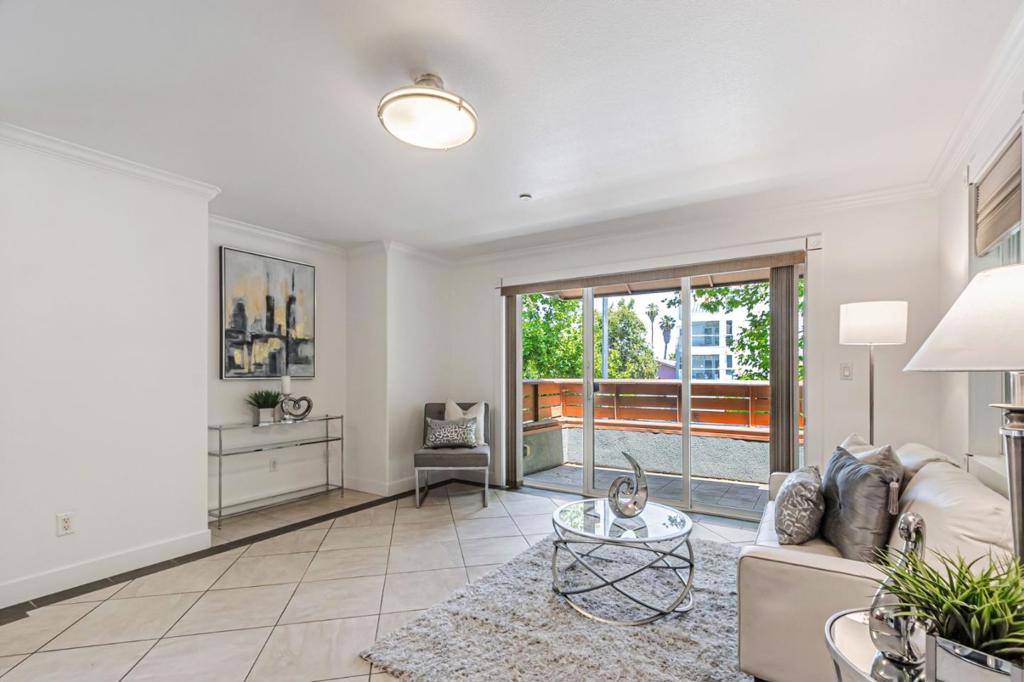 Discover this gorgeous 1-bedroom, 1-bathroom, corner 2-story unit condo in downtown San Jose! Located on the second floor, this unit offers enhanced privacy, abundant natural light, and a charming private balcony perfect for your morning coffee or evening unwind. You'll love the convenient Silicon Valley location, offering quick access to San Jose International Airport, Highways 87, 101, and 280, as well as VTA public transportation. Enjoy a short commute to tech giants like Google Village, PayPal, Kaiser, and Adobe, as well as Santa Clara University and San Jose State University. This home boasts modern flooring (water-resistant plank and tile), a stylish kitchen with granite countertops, and a granite vanity in the bathroom. For ultimate comfort, it features an in-unit washer/dryer, air conditioning, forced-air heating, dishwasher, and refrigerator. With an open floor plan ideal for entertaining and two assigned covered carport parking spaces, this desirable condo also features attractive low HOA dues of just $282 per month.