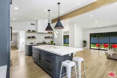 Photo of 935 N Kenter Avenue, Los Angeles, CA 90049 (MLS # 26875193)