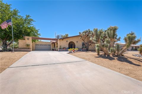 Photo of 56661 Desert Gold Dr. Dr, Yucca Valley, CA 92284 (MLS # JT25214437)