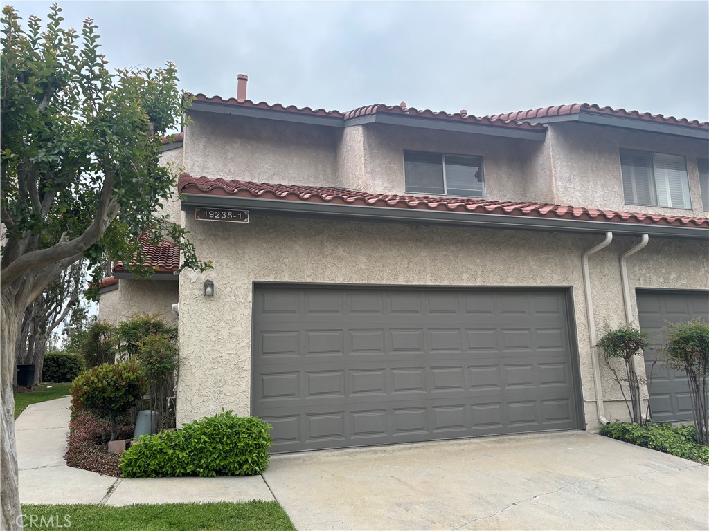 Your opportunity awaits! First time on the market since 1980, this Trust Sale home in a prime Porter Ranch location is your opportunity to own a lovely end-unit Townhome in the gated community of View Ridge! At Nearly 1,700 sqft, this home features an open floorplan between the living room, dining area and kitchen. The living room features a fireplace, and the downstairs den with closet can easily be transformed into a fourth bedroom. The presence of a full bathroom on this level adds to the versatility and functionality of this home. Upstairs, the primary suite boasts a sizable walk-in closet and a private ensuite bathroom featuring a separate vanity area and shower. The two additional upstairs bedrooms are spacious and share a full bathroom. The attached two-car garage offers secure parking with direct access and plenty of accessible storage space. The View Ridge community offers a variety of resort-style amenities, featuring pools, spas and tennis/pickleball courts, a playground and gated entry, all surrounded by manicured greenbelts. This HOA includes Spectrum cable and internet, as well as earthquake insurance! The home offers convenient freeway access, renowned schools, nearby hiking trails, parks, the Porter Valley Country Club, as well as a great variety of shopping and dining options at the New Vineyards shopping center. If you are looking for a residence in a well-maintained Porter Ranch community, this townhome is the perfect fit for you! The home just needs TLC, and with your personal touch you can transform it to your own family retreat. Don’t miss out on this one!